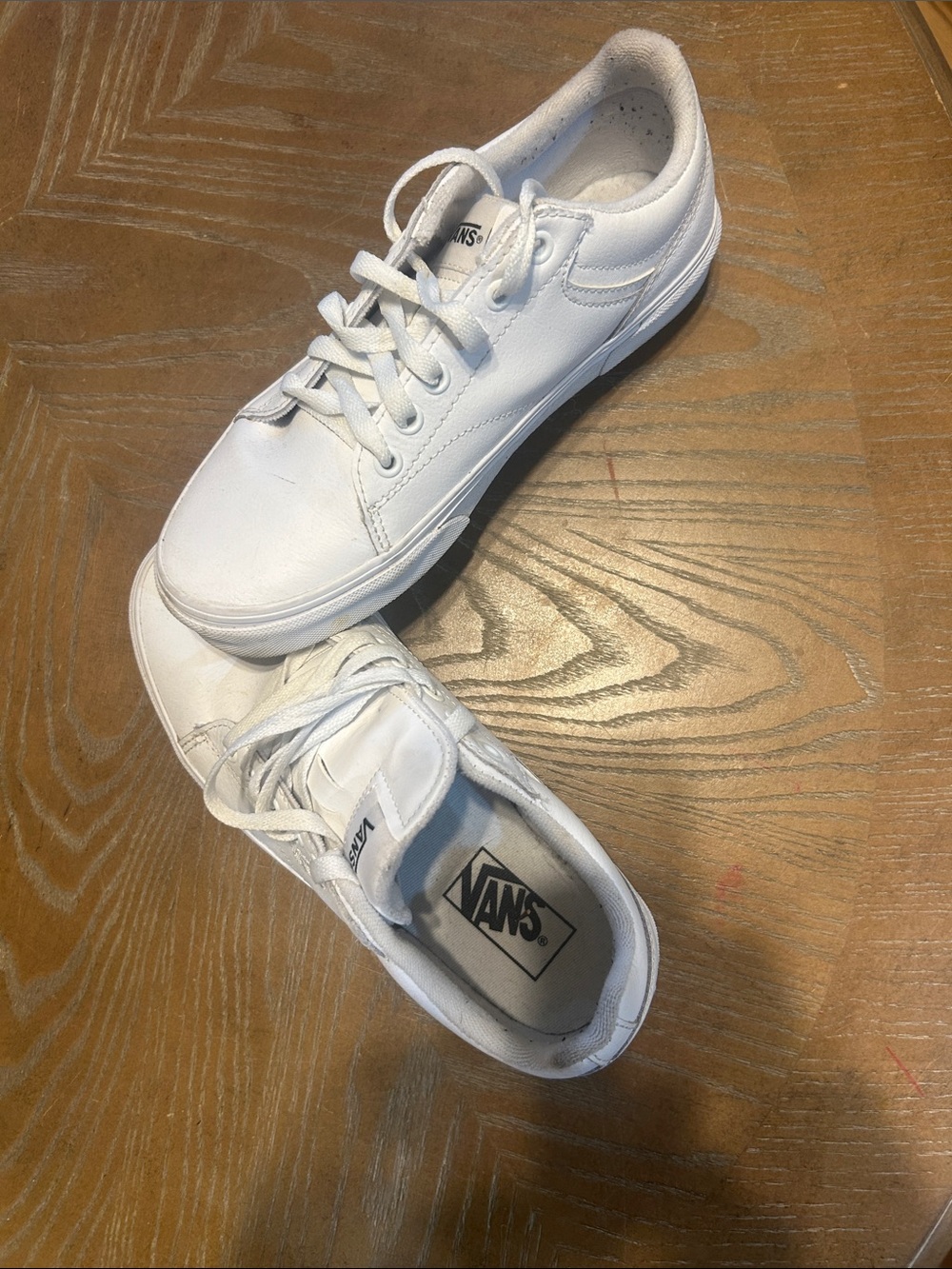 Vans white low-top canvas sneakers